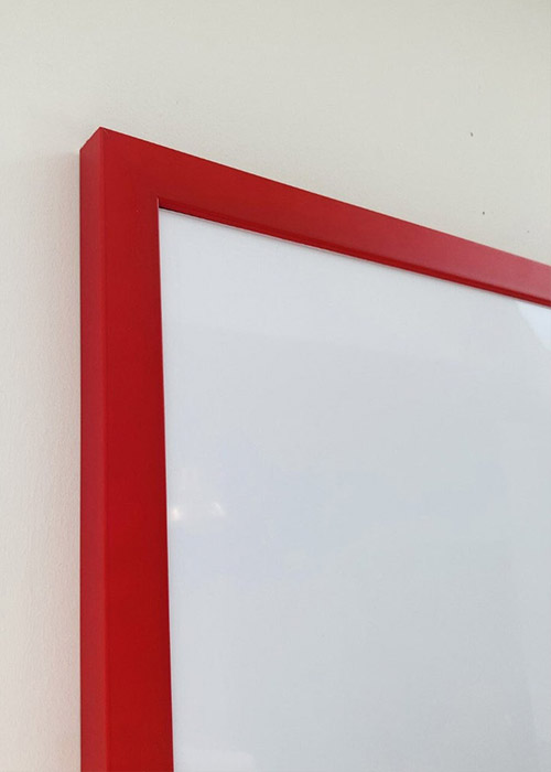 Red framed magnetic white board