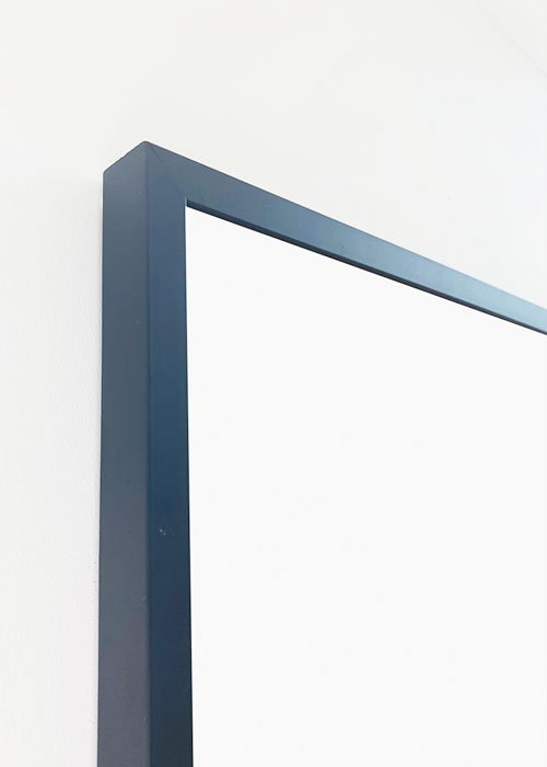 Black framed magnetic white board